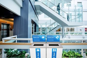 Busch Systems Spectrum Series PPE recycling containers in a hospital