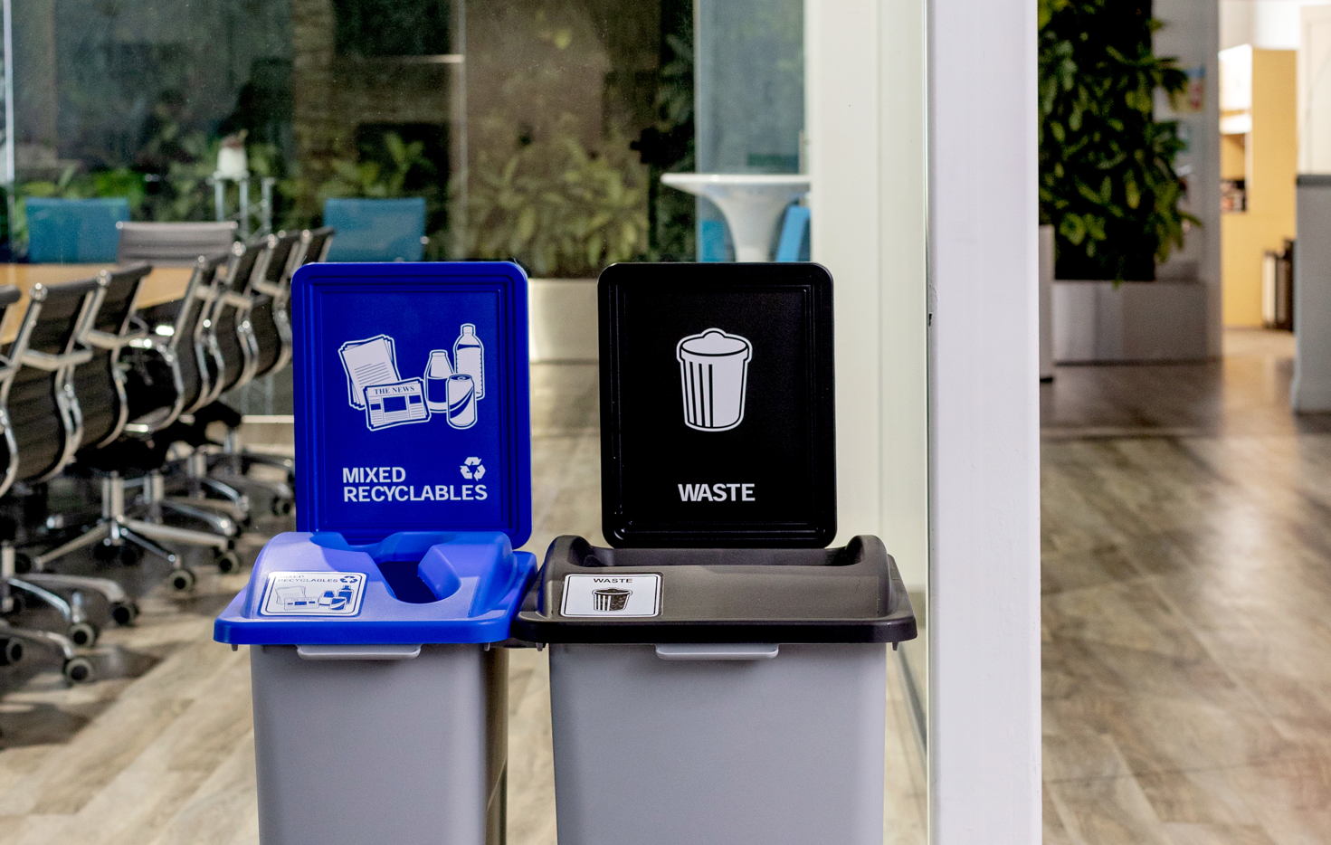 Recycling and waste containers in an office