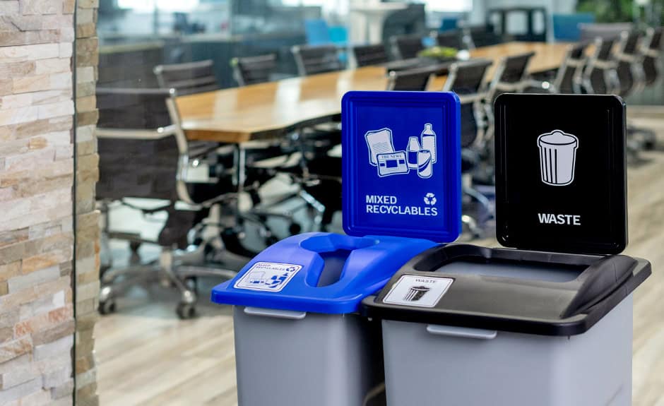 Waste Watcher Series waste and recycling containers in a modern office