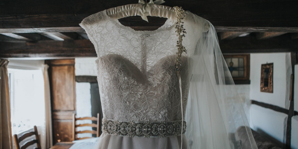 https://www.buschsystems.com/resource-center/images/uploads/library/wedding-dress-2.png