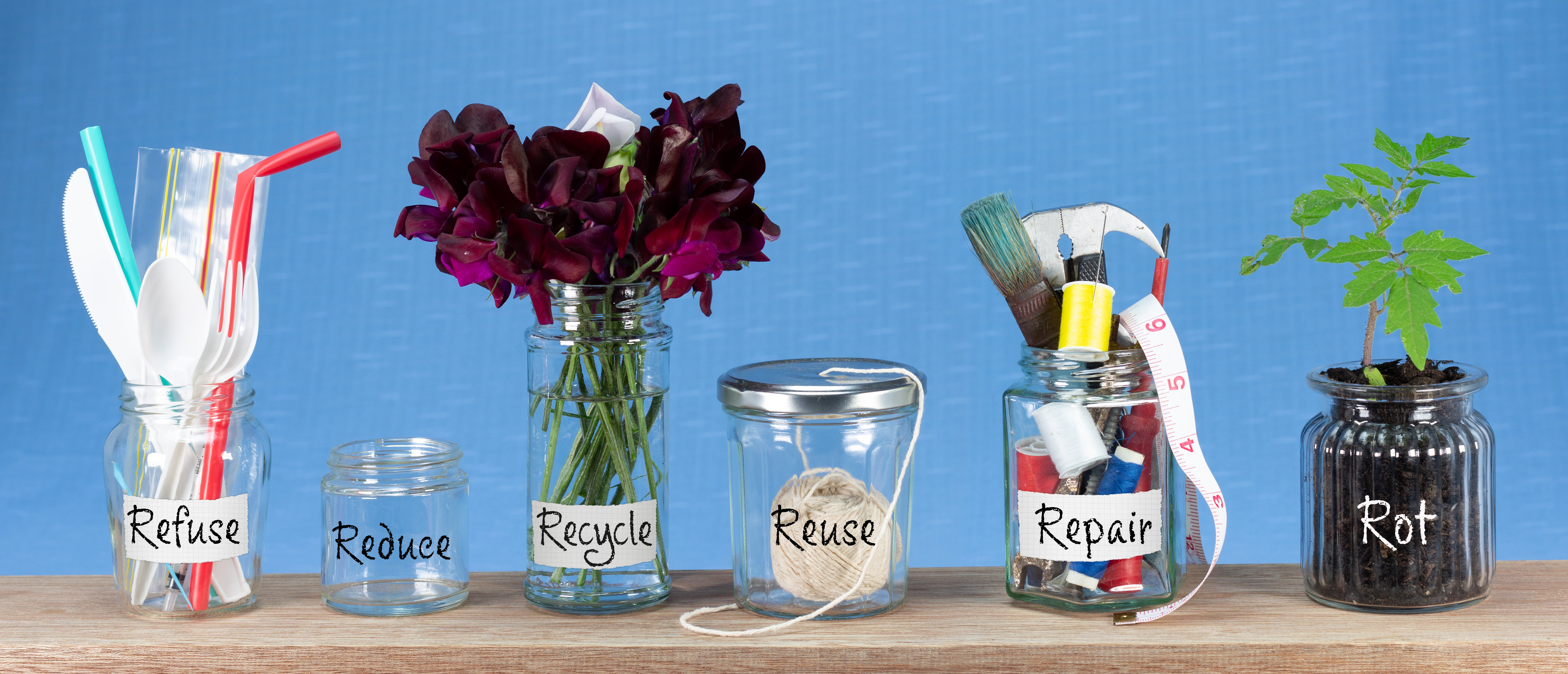 Jars to show recycling stages including Repair and Rot